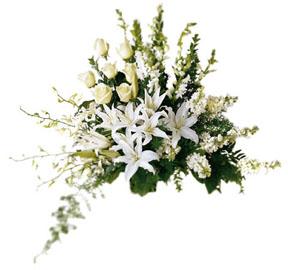 The FTD Light In Your Honor Arrangement
