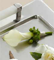The FTD White Calla Boutonniere